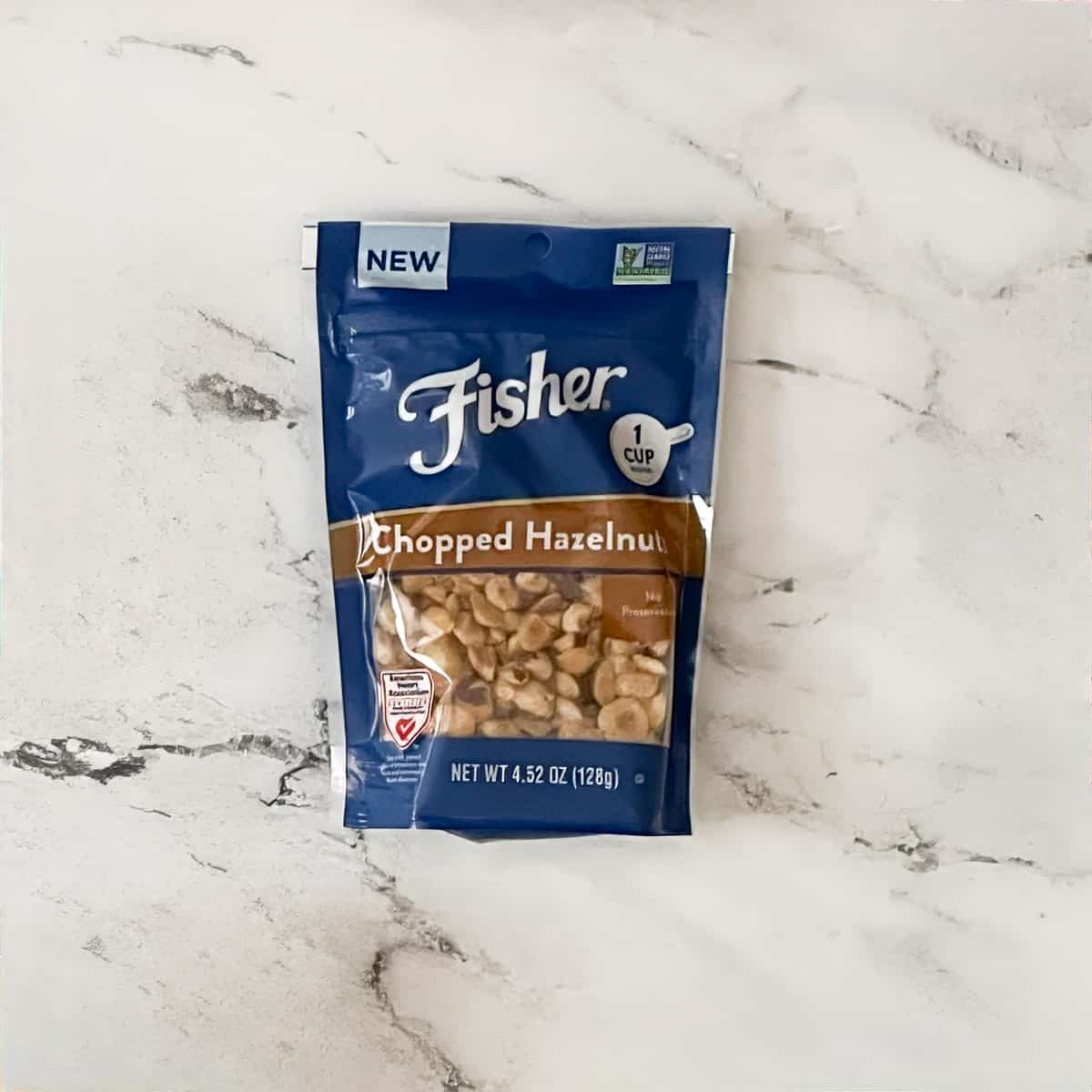 A bag of Fisher's Chopped Hazelnuts.