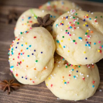 Italian anise cookies with multi-colored nonpareils sprinkled on top.