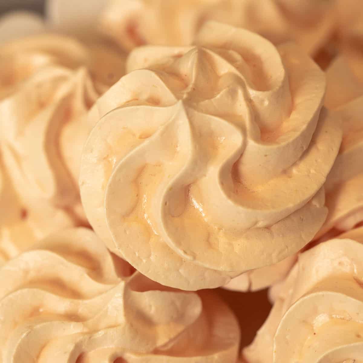 Tangerine Meringue Cookies in a swirl pattern.