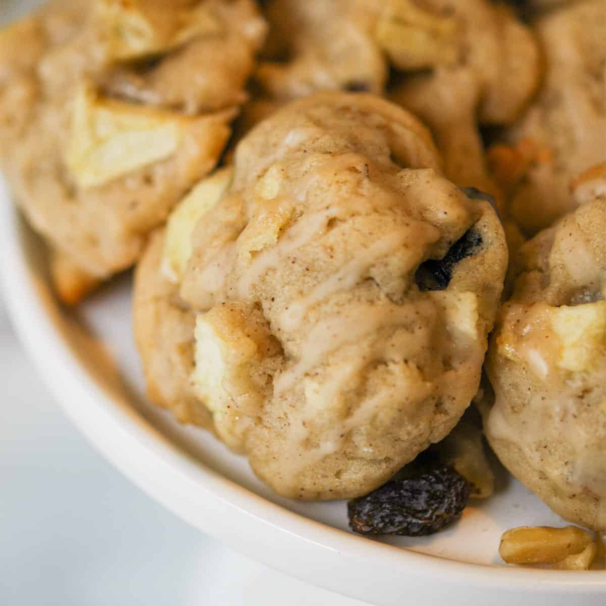 Apple cider cookies on a white dish.