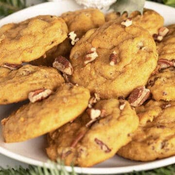 Sweet potato pie cookies on a white plate ready to eat.