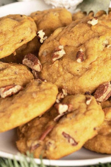 Sweet potato pie cookies on a white plate ready to eat.