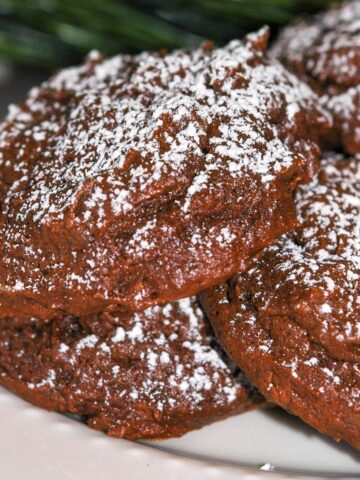 Cream Cheese Chocolate Cookies on a white plate ready to eat.
