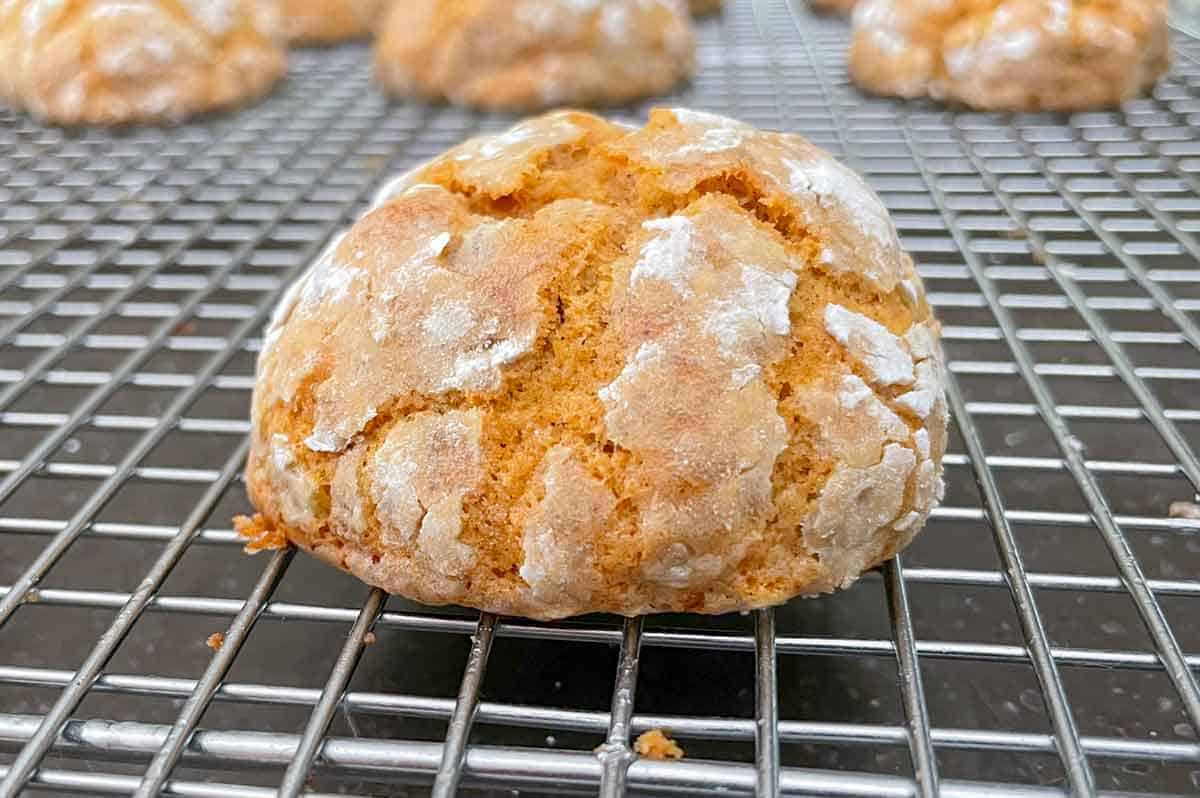 Pumpkin with applesauce and walnut cookies cooling on a wire rack.