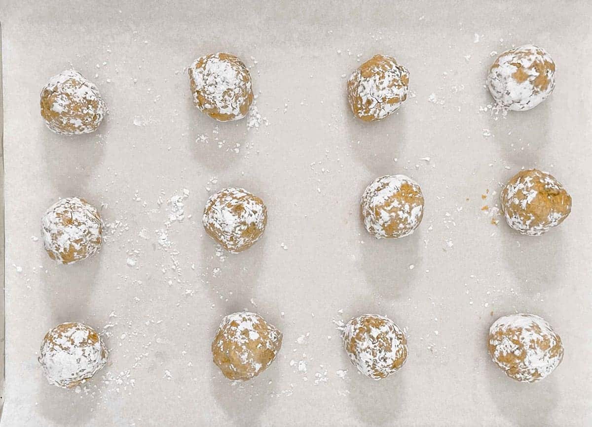 Pumpkin with applesauce and walnut batter rolled into balls and coated with powdered sugar.