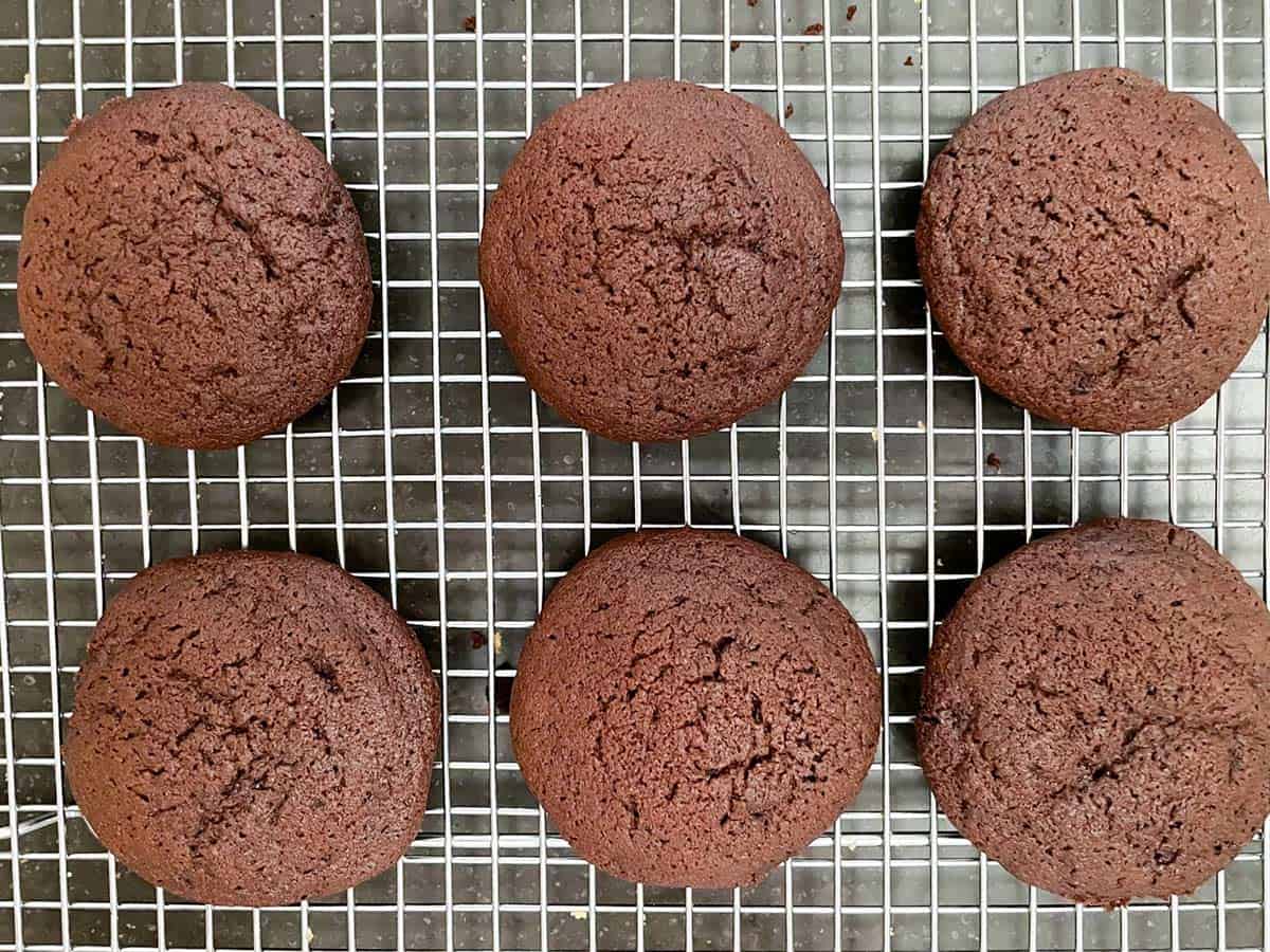 Mocha cookies cooling on a wire rack.