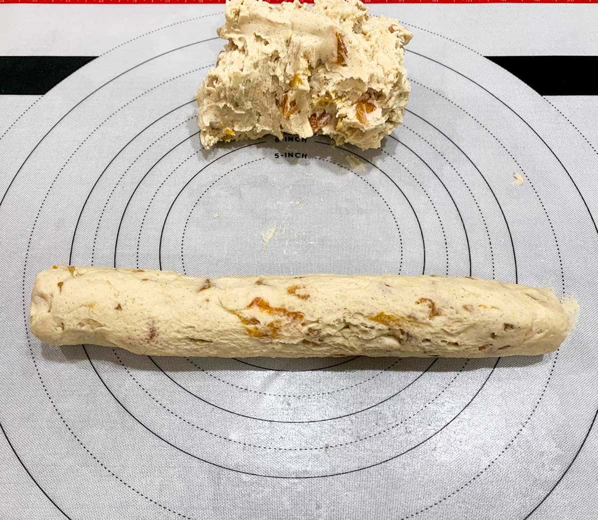 Divide cookie dough and roll each half into logs