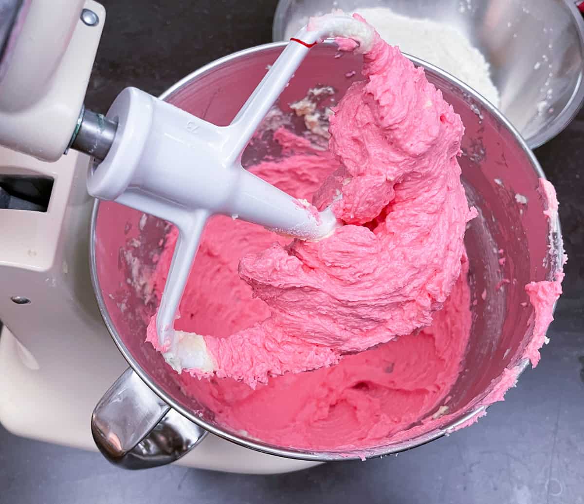 The color of pink for the cookie dough before adding flour. That will tame the color a little.