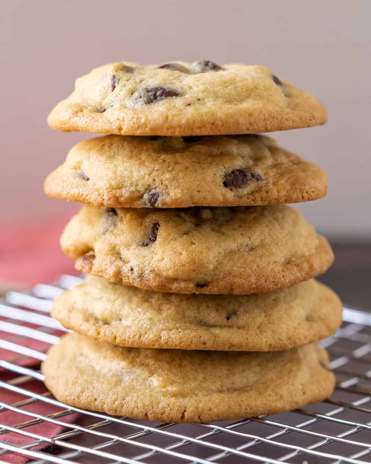 Stack of cookies on a wire rack.