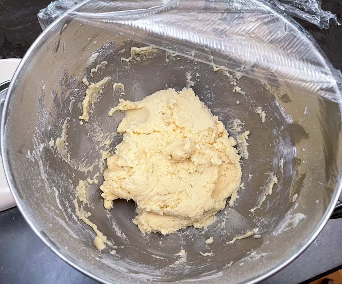 Cream Cheese cookie dough mixed and in bowl that will be covered and refrigerated.