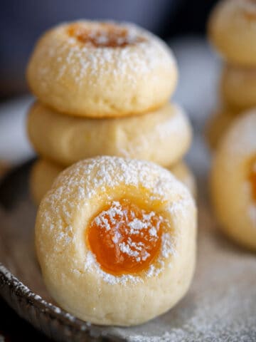 Close up of a finished apricot preserved filled cookie.