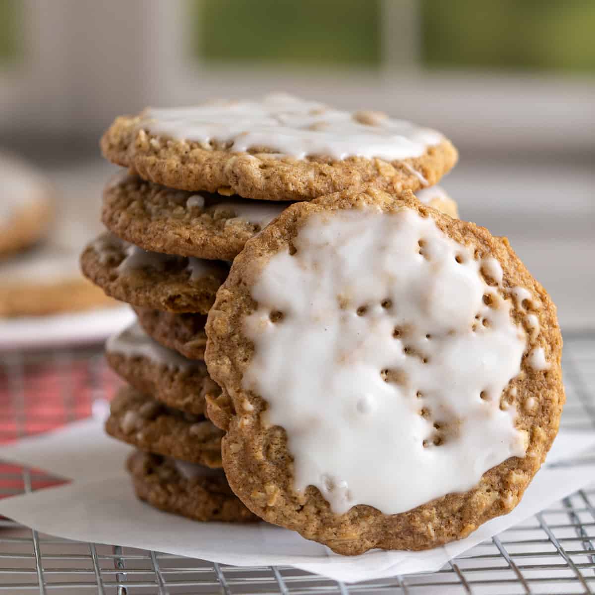 Close-up of stack of cookies with one leaning against the stack.