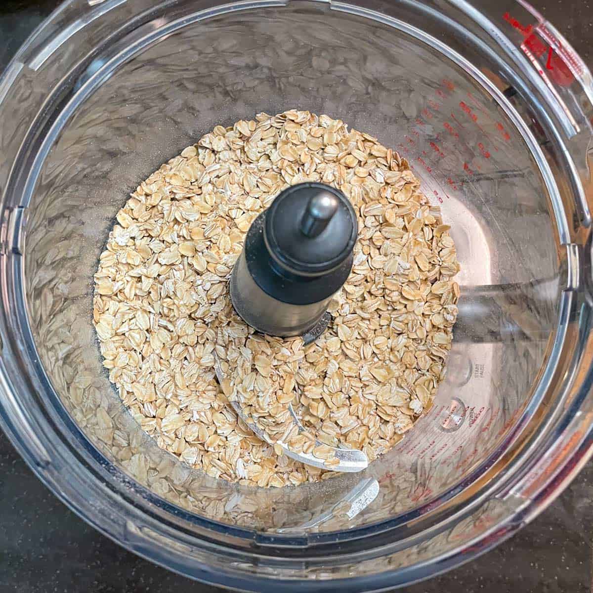 What oats in a food processer looks like before pulsing them.