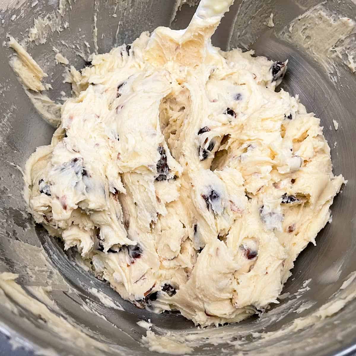 All ingredients in the bowl and mixed for the cherry almond cookies.