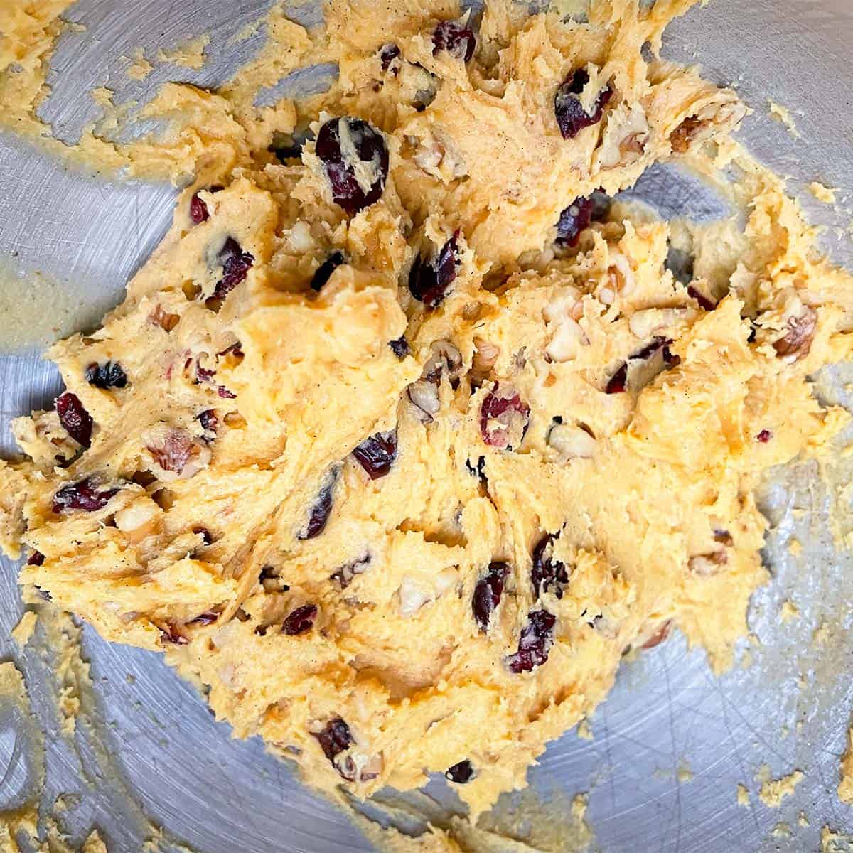 All ingredients are mixed together for the pumpkin cranberry cookies.