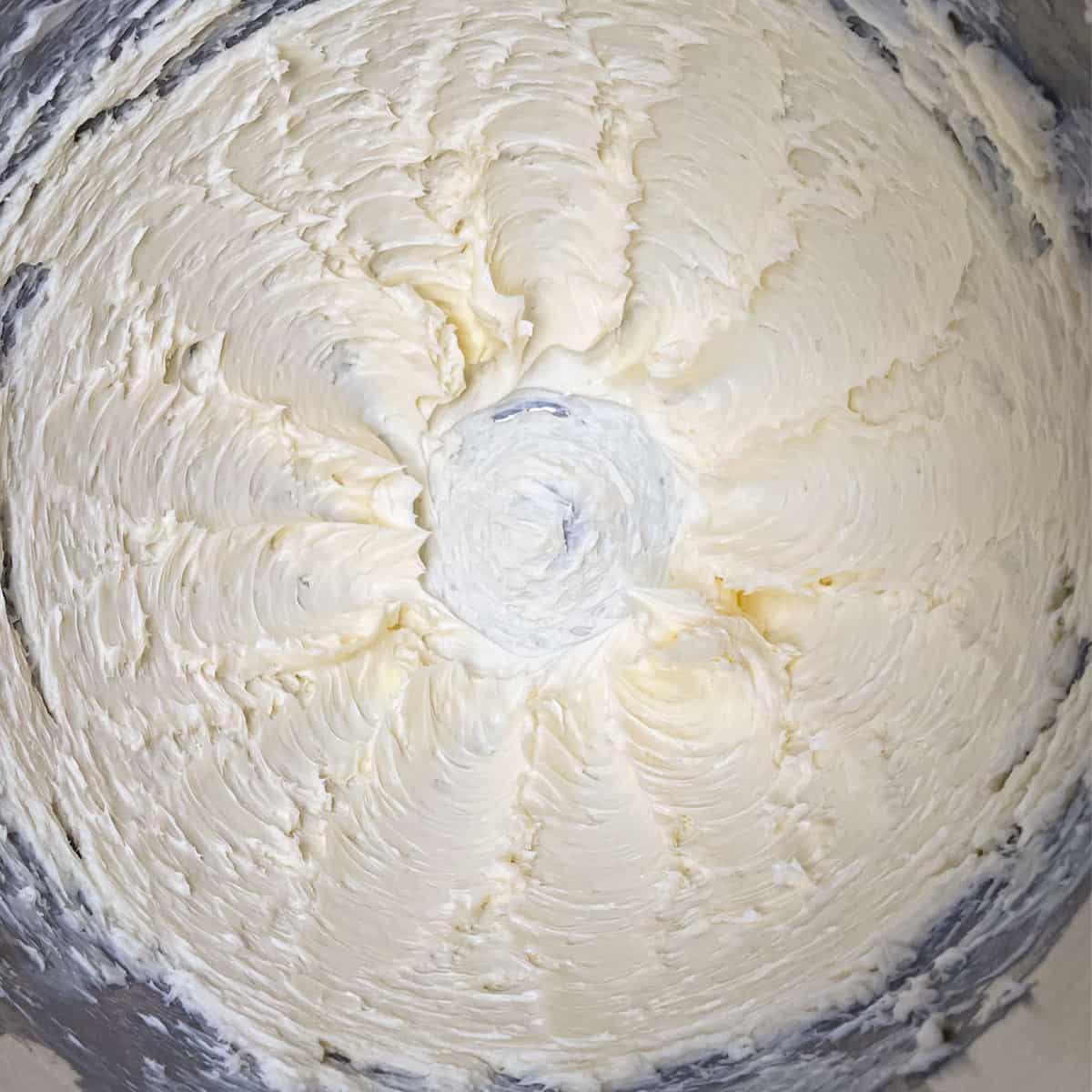 Butter that has been creamed in a mixer bowl.