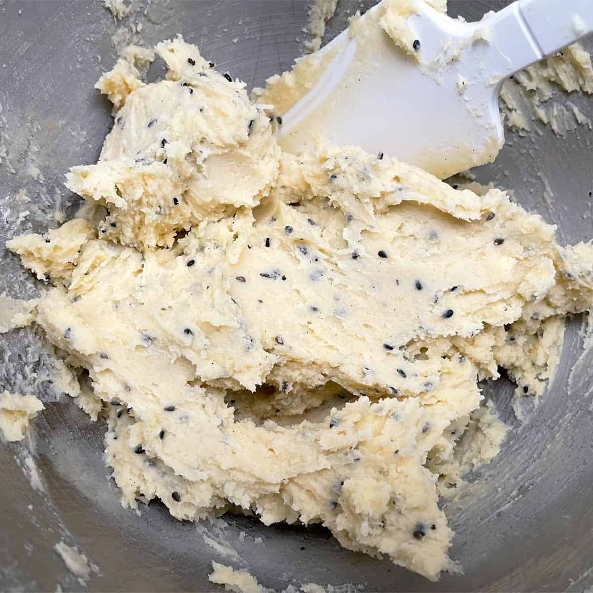 Cookie dough all mixed for black sesame butter cookies.