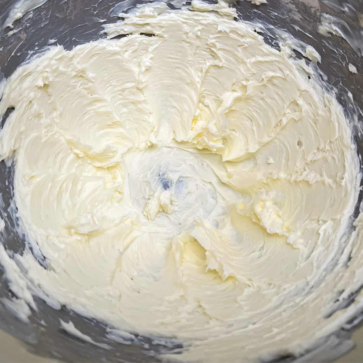 Starting with just butter in the mixer. Smooth and creamy so you know it mix well with the sugar.