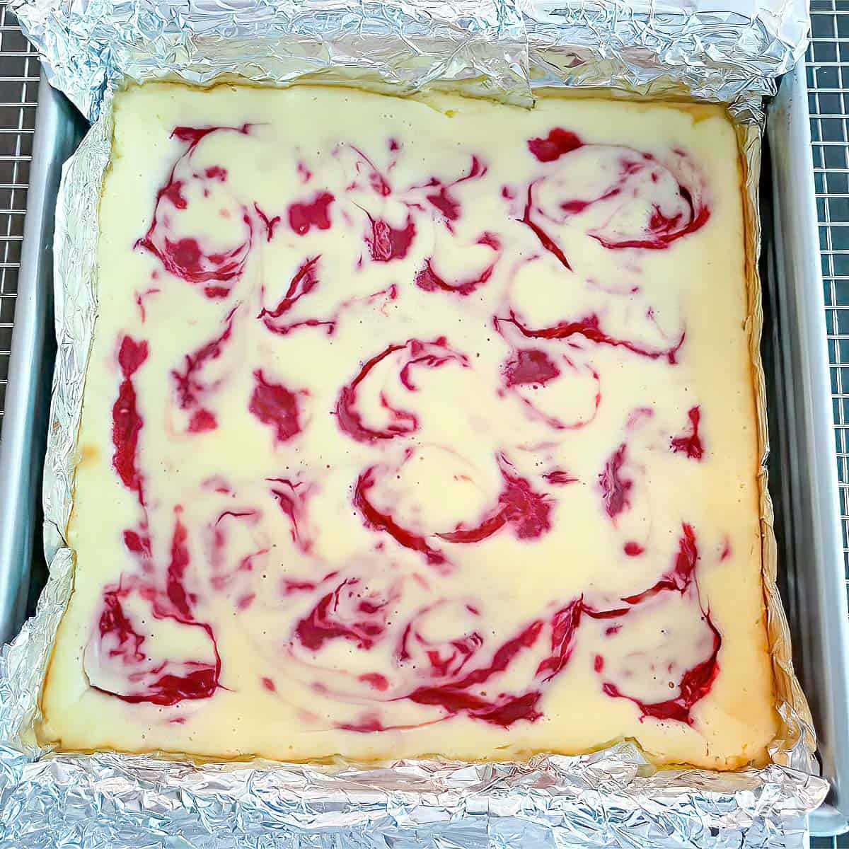 Cheesecake cooling after being baked.