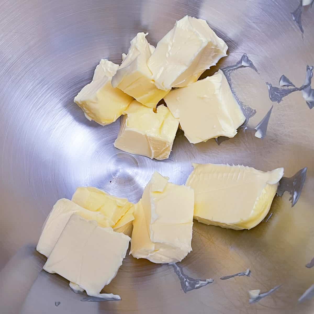 Butter cubed and added to mixer bowl.
