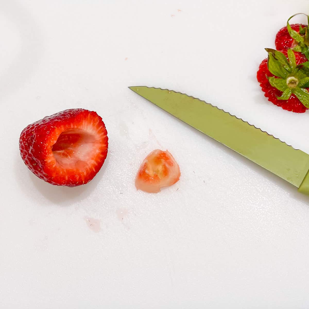 A hulled strawberry which is the center cut out.