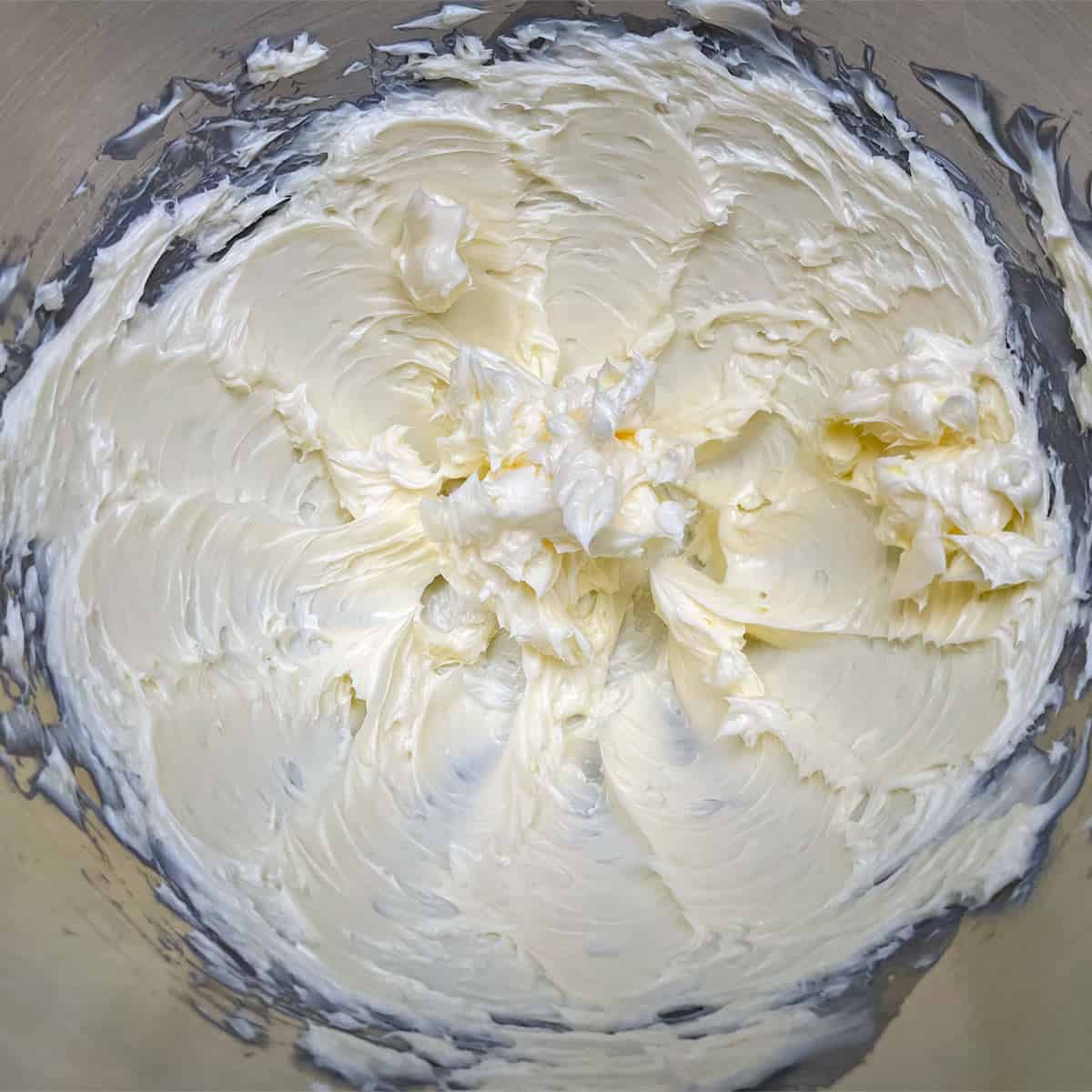 Butter that has been creamed in a mixer bowl.