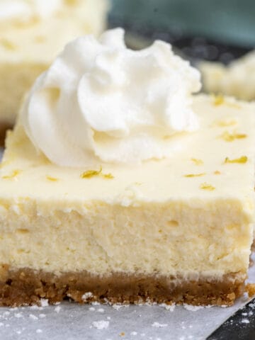 Close up of a creamy key lime cheesecake bar.