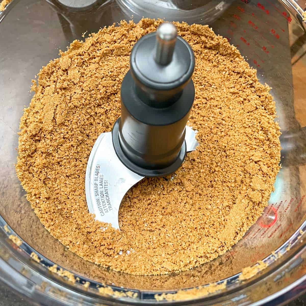Graham crackers and macadamia nuts pulsed to a crumb texture in a food processor.