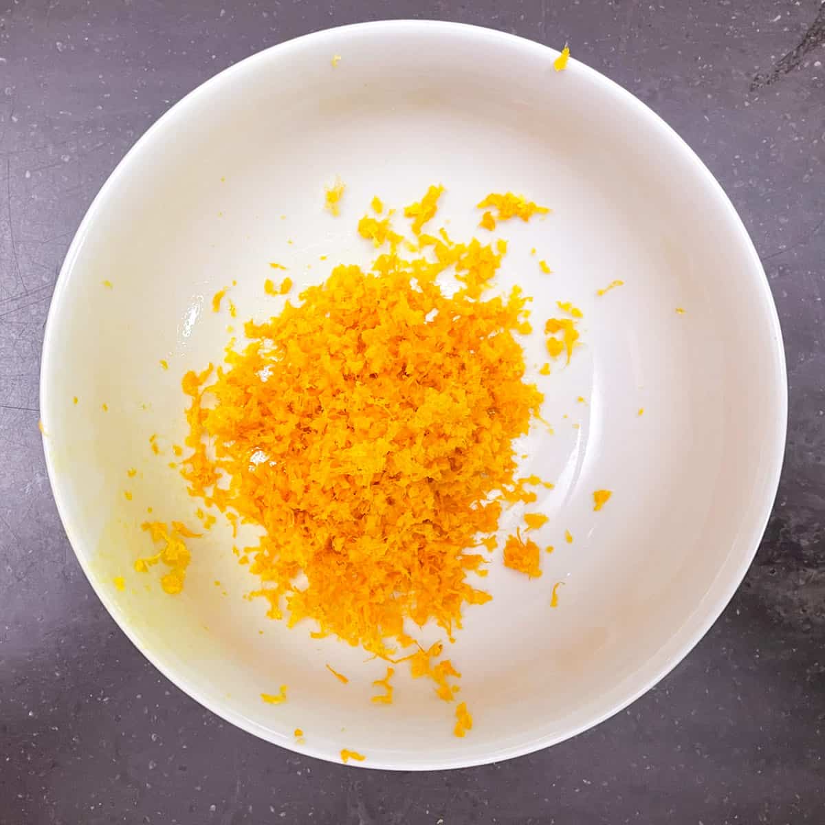 Orange zest in a bowl.