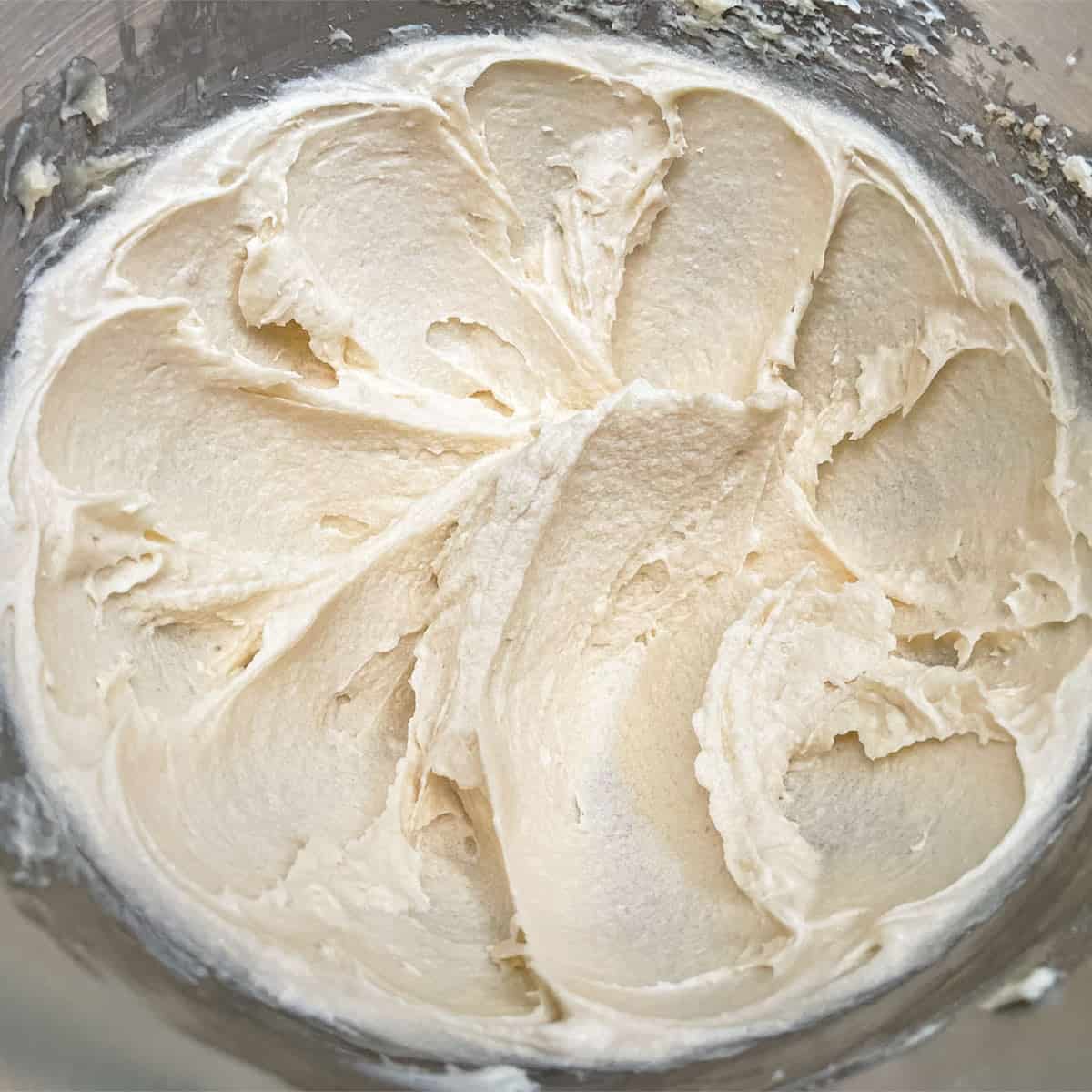 Creamy looking butter, cream cheese, and both sugars are beaten for three minutes.