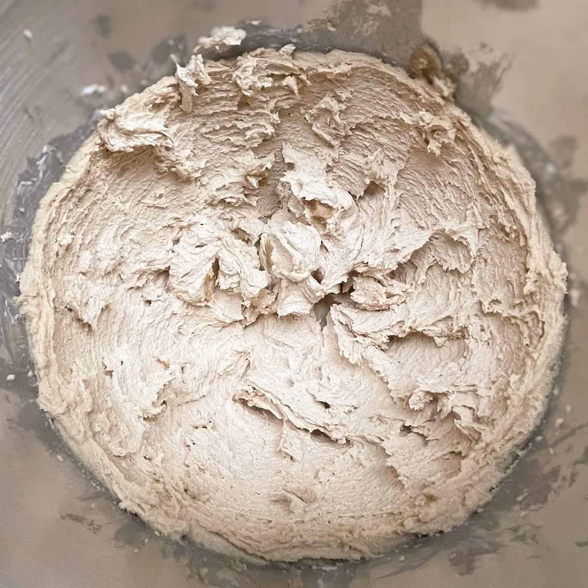 Cookie dough with everything but the dry ingredients, looks creamy.