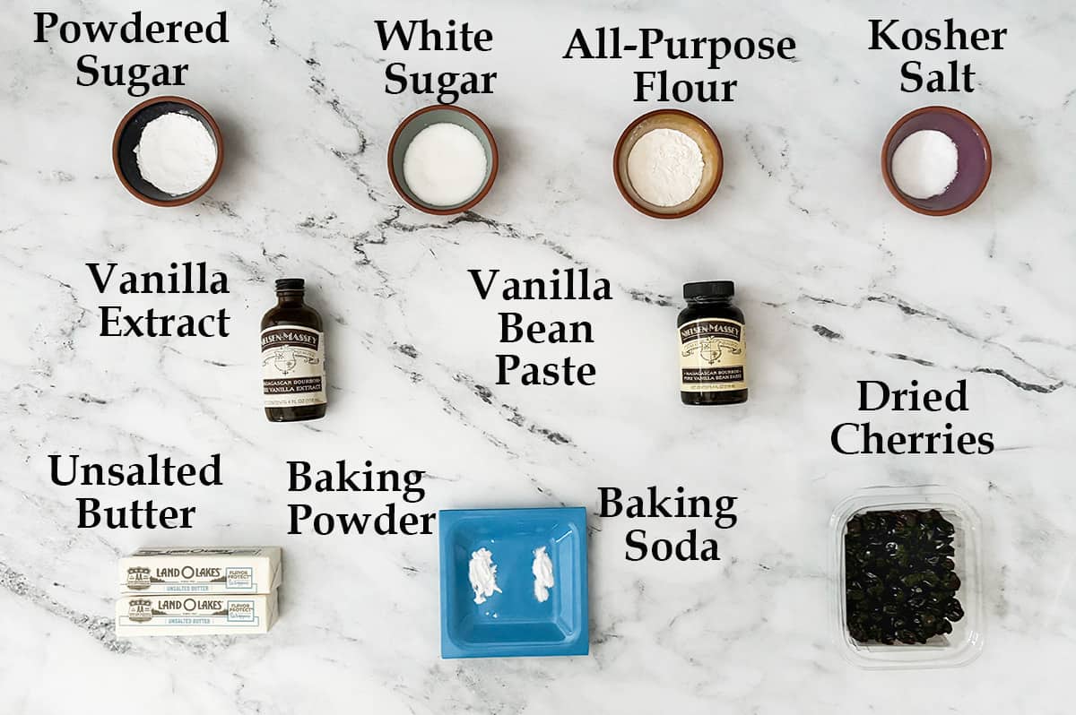 Ingredients to make vanilla cherry cookies.