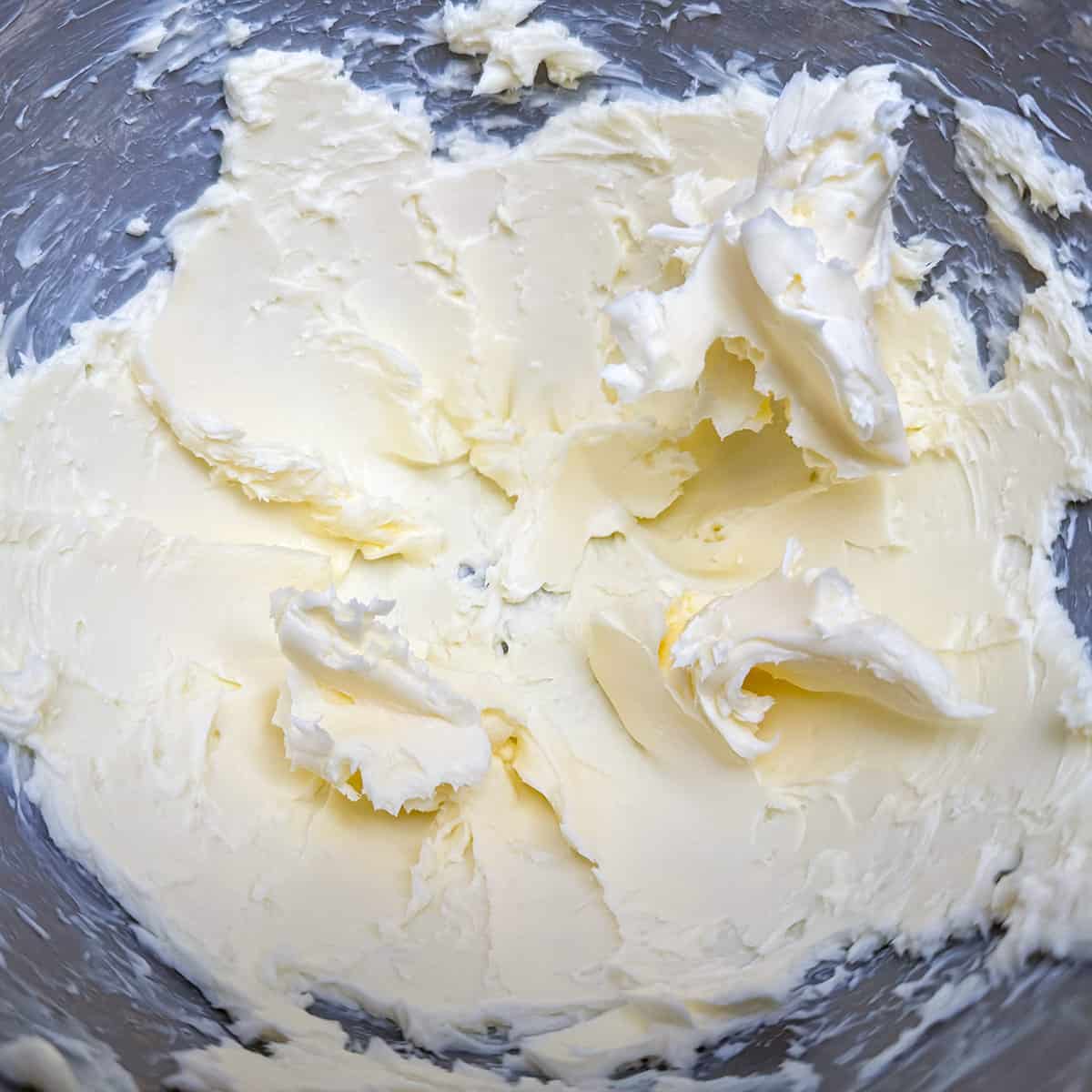 Creaming butter in a mixer.