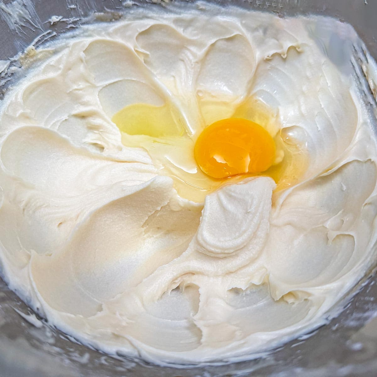 Now is the time to add the egg and the vanilla extract.