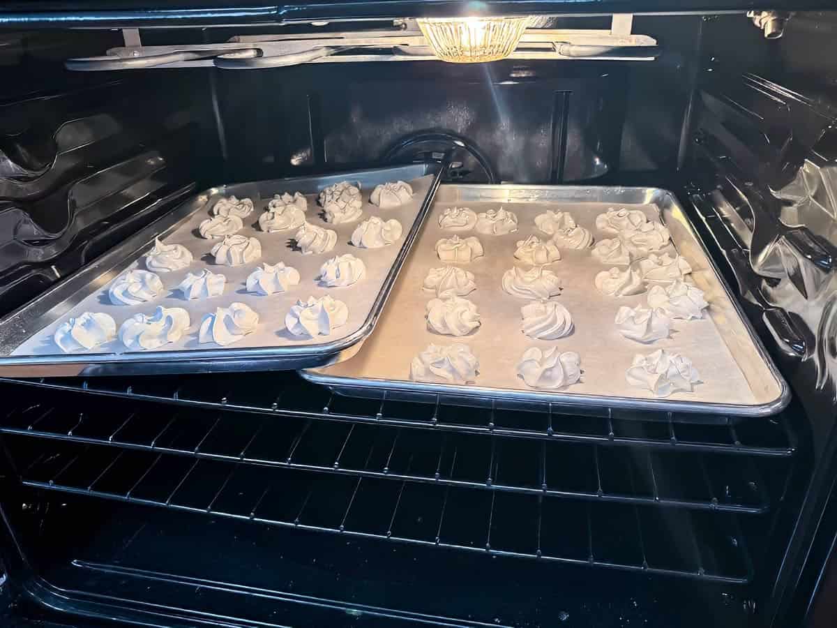 Baking the cookies all at once by slightly overlapping the sheet pans in the oven.
