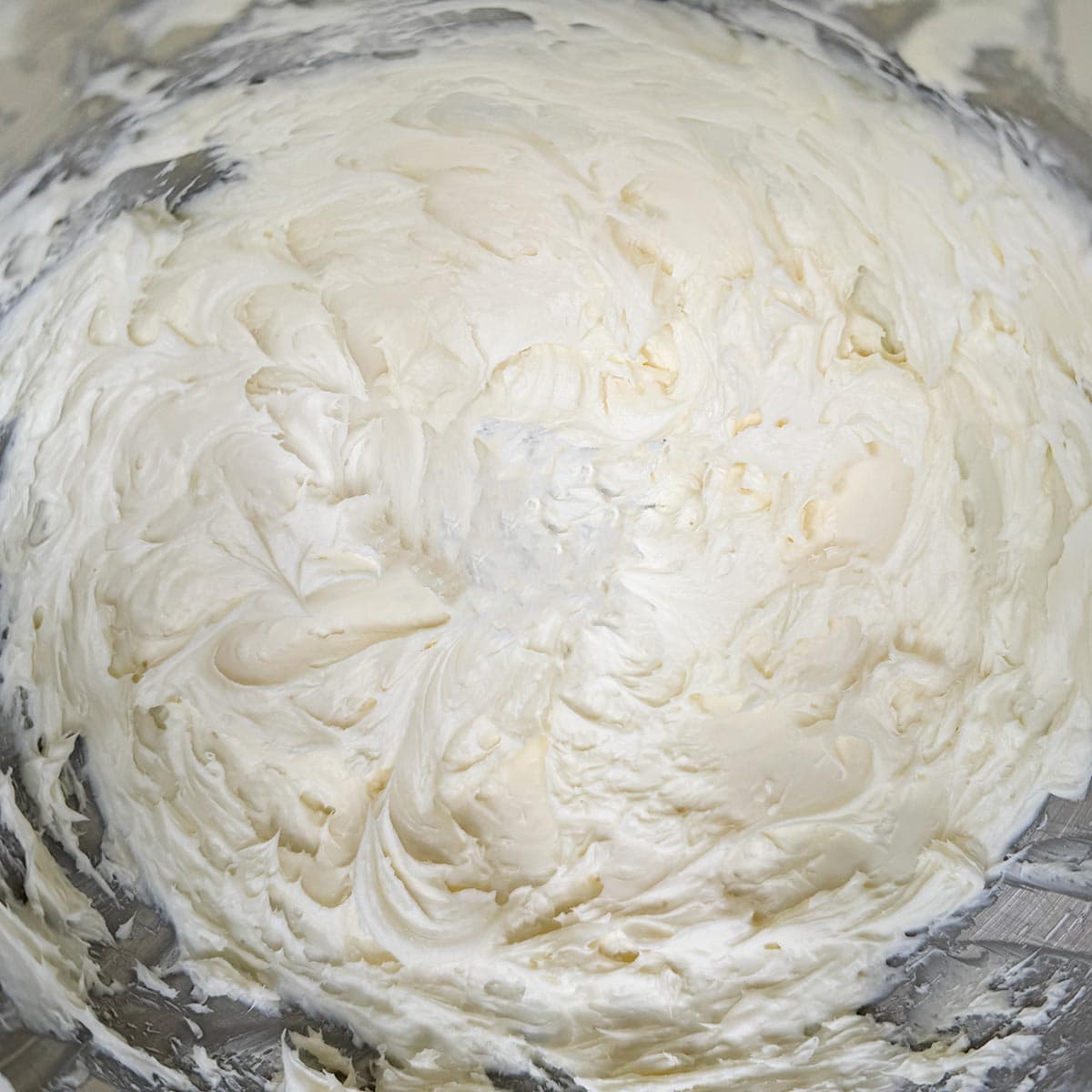 Cream cheese and sugar blended into a creamy mixture.