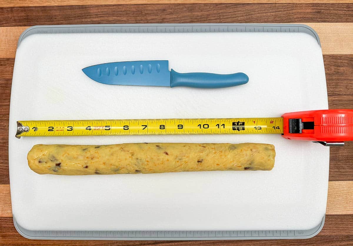 A ruler next to the cookie log to measure each score mark.