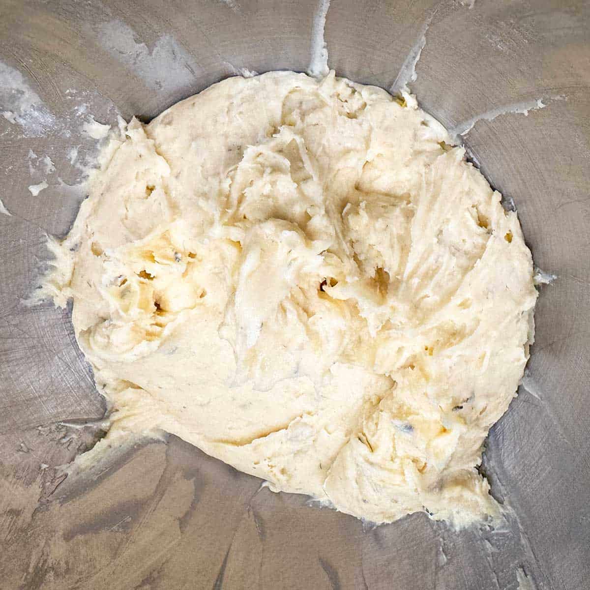 Cookie dough looks all together after adding the flour.