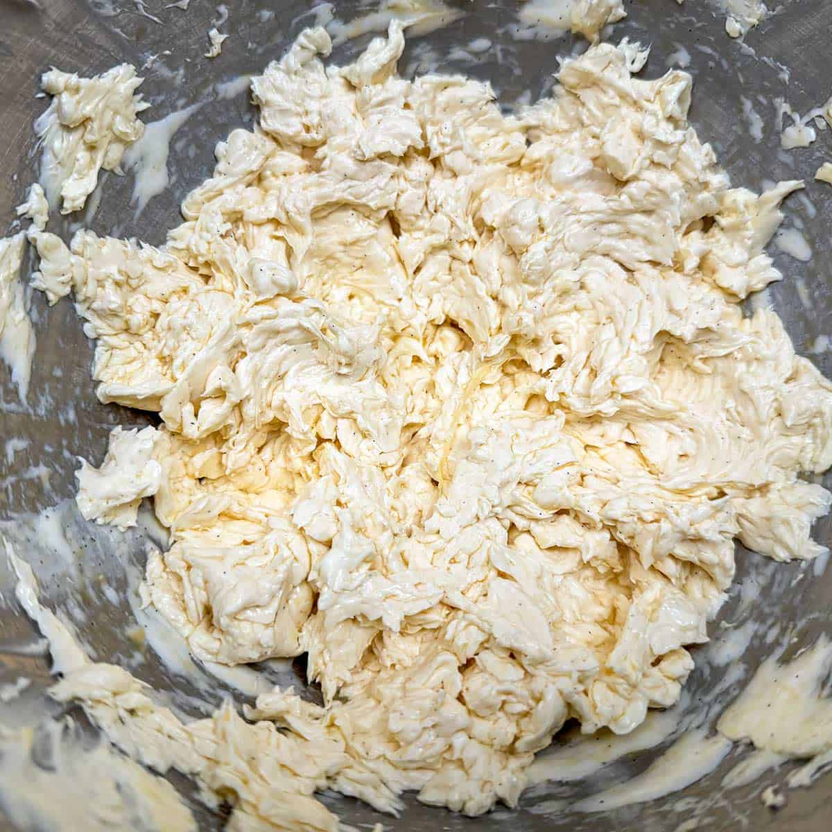 Egg added to butter sugar mixture.