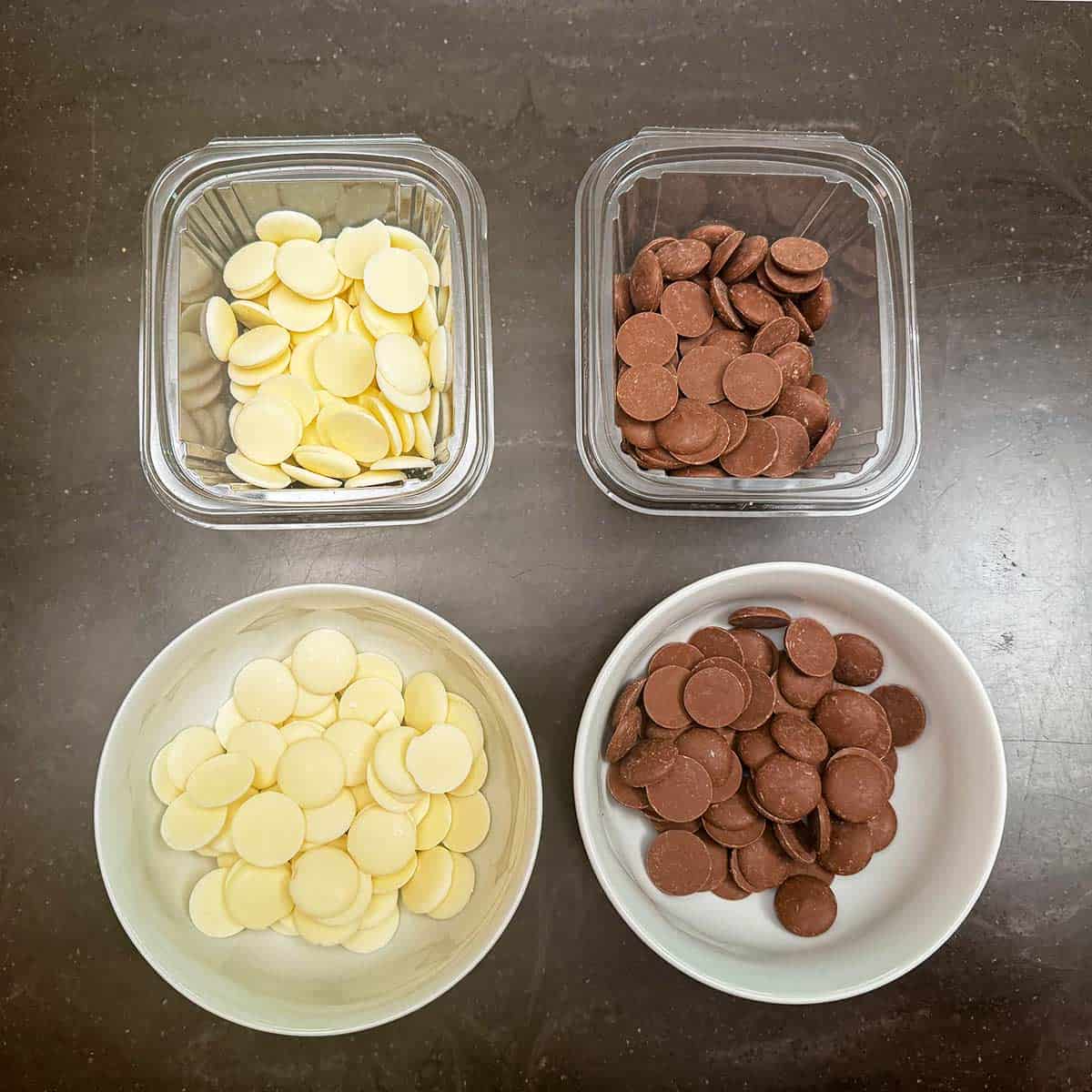 Both wafers for topping white and milk chocolate in bowls.