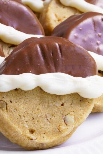 Hazelnut espresso shortbread cookies arranged on a plate.