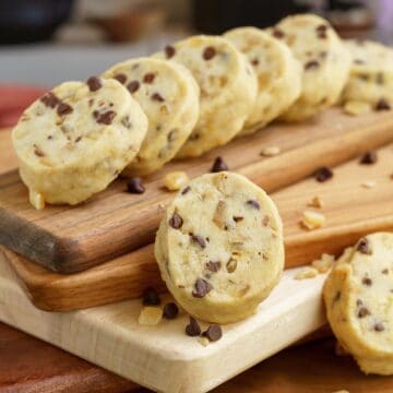 Chocolate with walnuts and orange peel shortbread cookies close up of a cookie.