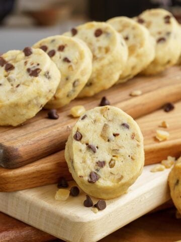 Chocolate with walnuts and orange peel shortbread cookies close up of a cookie.