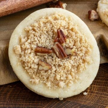 Front view of the breakfast coffee cake cookie on a wooden board.