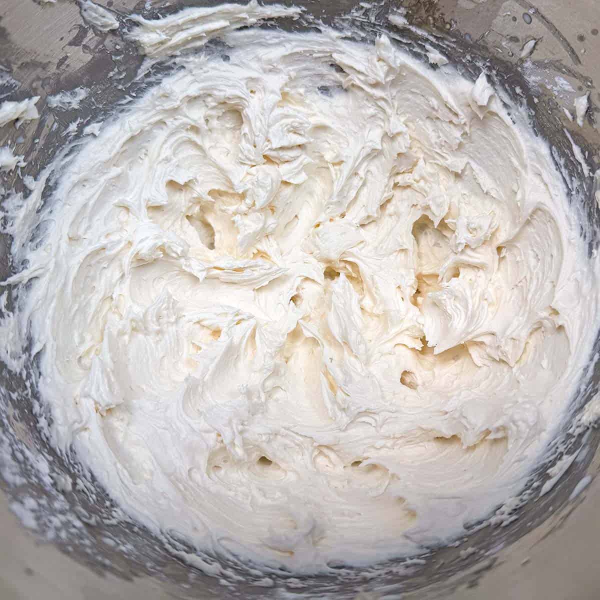 Completed frosting for the cookies in a mixer bowl.