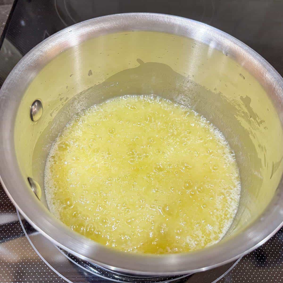 Butter in saucepan just starting to become clear.