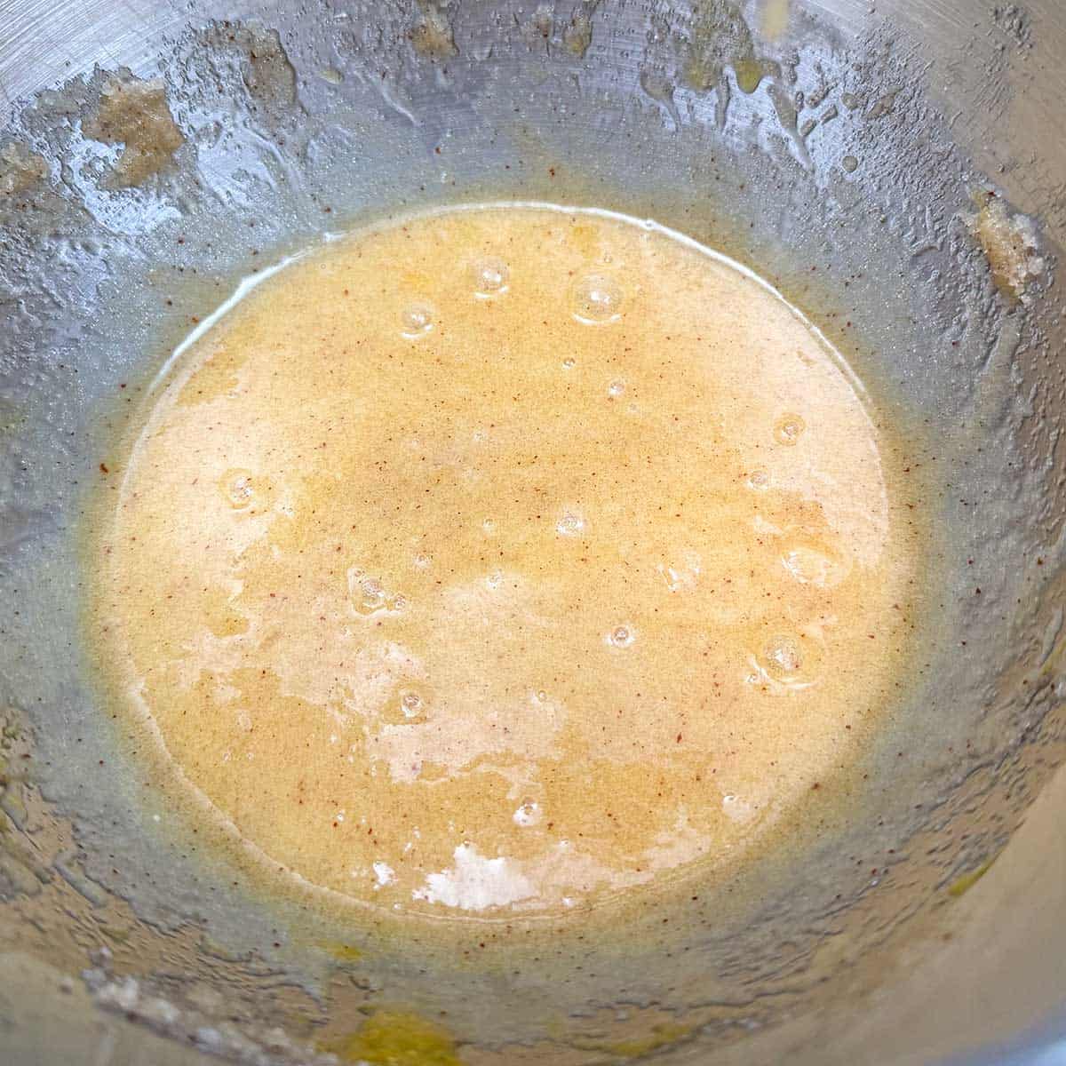 Brown butter, eggs, and sugar that has been mixed and just before the flour.