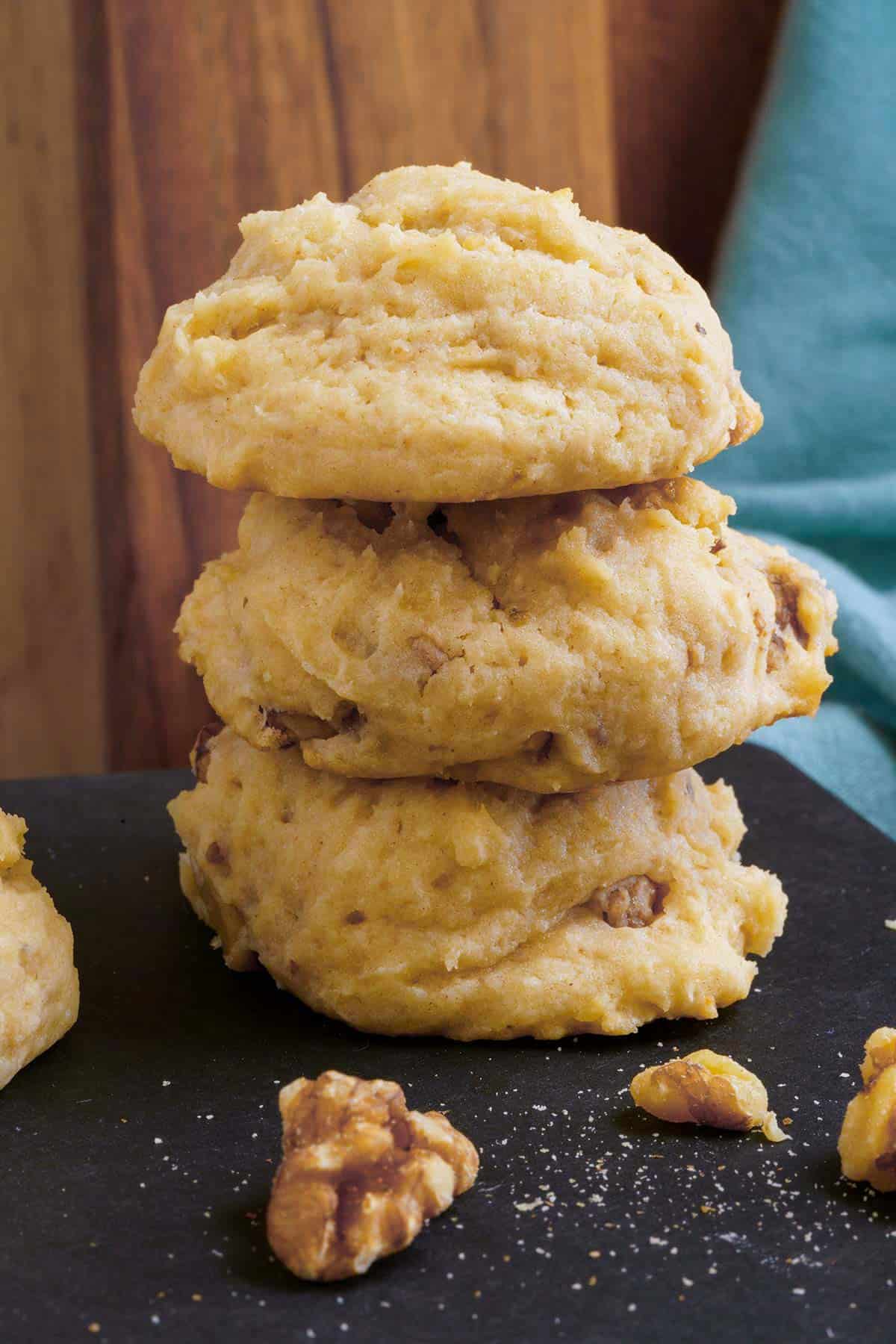 A stack of the Galzed Maple Walnut Cookies on a board.