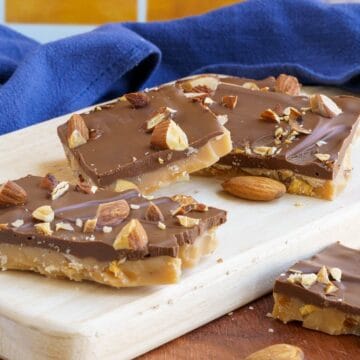 English Toffee with Almonds with a layer of chocolate on top with almonds.