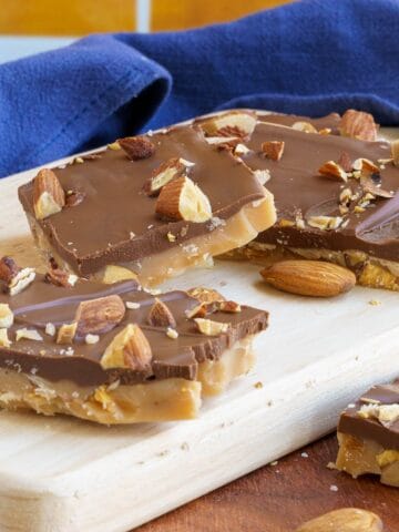 English Toffee with Almonds with a layer of chocolate on top with almonds.